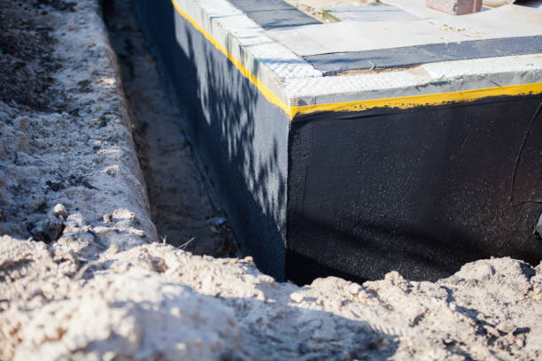 Professional Waterproofing technician working in Plainfield, IL